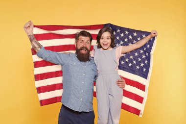 Independence is happiness. Patriotic family cheerful and friendly. Independence day holiday. How do americans celebrate independence day. Father bearded hipster and cute little daughter with USA flag clipart