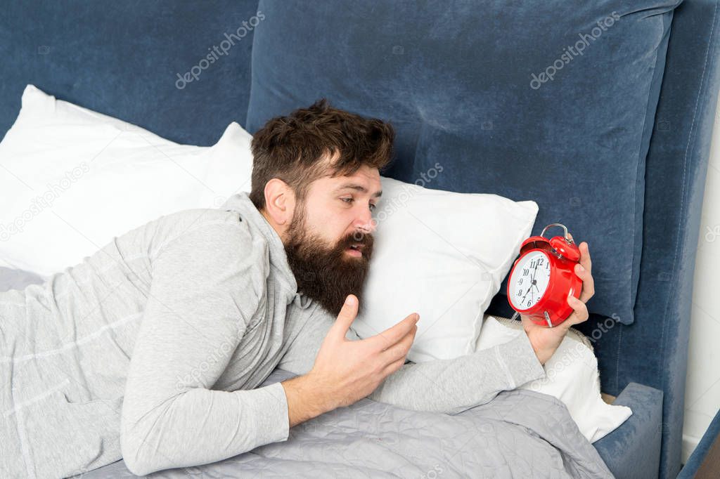 cant stand the noise. Health care. need more relax in bed. stressed and unhappy man. bearded man hipster want to sleep. morning awakening. hate noise of alarm clock. Stages of sleep. Man at home