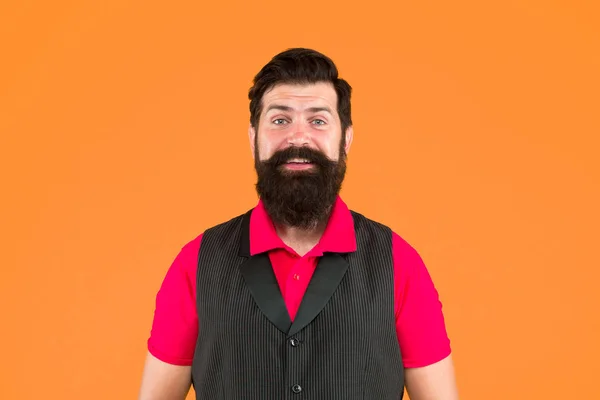 Beard divides boys from men. Bearded man orange background. Happy hipster with long beard hair. Grooming mustache and beard. Barbershop. Barbers salon — ストック写真