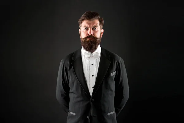 Secure in his sense of self. Bearded man with formal look. Hipster black background. Man with long mustache and beard hair. Brutal man in tuxedo suit. Classic can make man look smarter — Stock Photo, Image