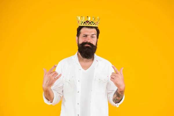 i am cool. brutal and handsome prince yellow background. Egoist selfish man. Narcissistic person. Superiority complex. Bearded man wear white. Love yourself. hipster man king costume party