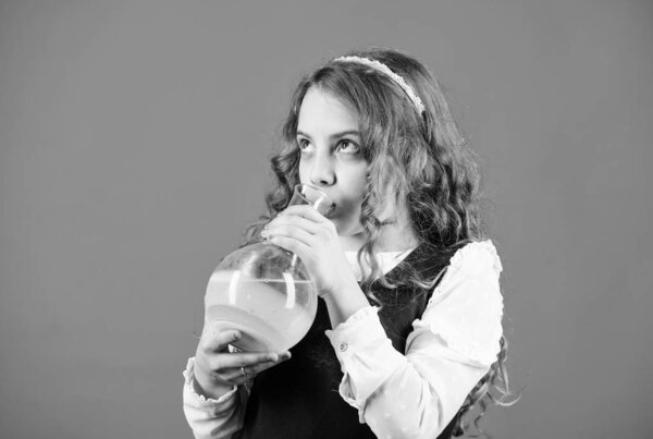 science research in lab. Small school girl. education and knowledge. Future. small girl scientist with testing flask. back to school. child study bilogy lesson. Ready for his final exam