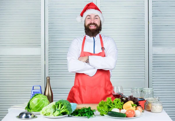 Christmas food. Cuisine culinary. Vitamin. Vegetarian salad with vegetable. Healthy food cooking. Mature hipster with beard. Happy bearded man. chef recipe. Dieting organic food. Christmas party time