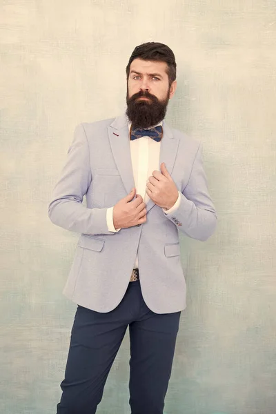 Groom bearded hipster man wear light blue tuxedo and bow tie. Wedding day. Stylish groom. Statement with his stunning crisp suit jacket. Stylist fashion expert. Suit style. Fashion trends for groom — Stock Photo, Image