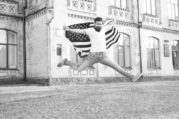 Join celebration. Patriotic guy expressing happiness in street. Patriotic spirit. Patriotic man jumping with american flag. Independence day. Bearded hipster patriotic citizen. Happy and proud