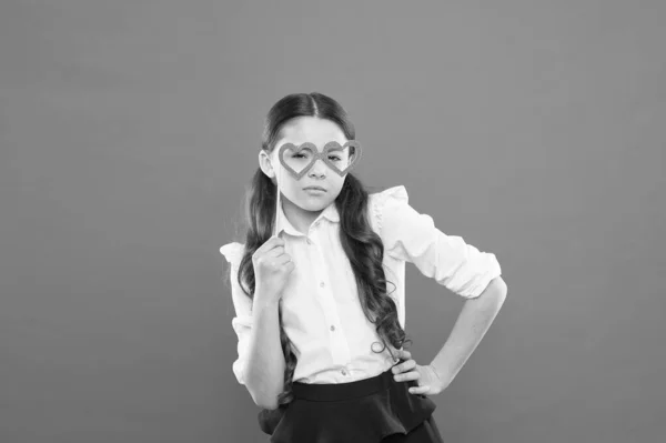 Enjoying pupil life. smart intelligent kid. back to school. love funny study. knowledge day. happy childhood. small girl student. school lover. school girl in uniform. child with party heart glasses