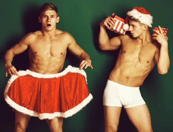 Hezký macho santa dvojčata — Stock fotografie