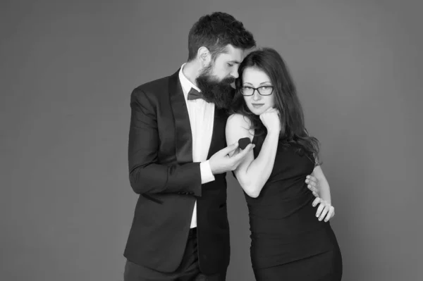 Will you marry me. Bearded man make marriage proposal to sexy woman. Hipster make wedding proposal to sensual girl. Couple in love. Love proposal and engagement. Jewellery and jewelry