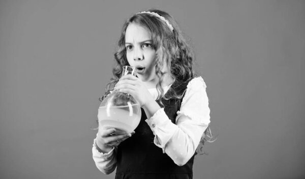 Really busy. science research in lab. Small school girl. education and knowledge. Future. back to school. small girl scientist with testing flask. child study bilogy lesson. Doing research
