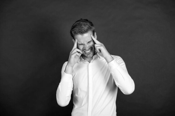 Real pain. Business man suffer headache hold hand head. Businessman feel pain headache stressful day. Stressful business life. Aggression causes headache. Need some medicines. Migraine concept