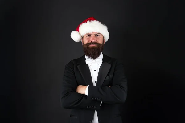 Man bearded hipster wear santa hat. Christmas spirit concept. Financial report. Manager ready celebrate new year. Christmas party office. Corporate holiday party ideas. Corporate christmas party