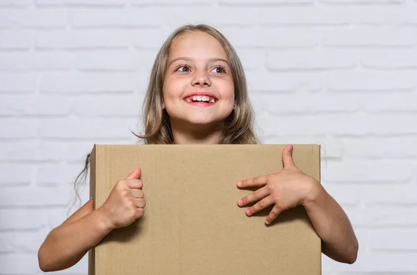 Rent house. Real estate. Make moving easier. Girl small child carry cardboard box. Packaging things. Move out concept. Delivering your purchase. Kid moving out. Moving routine. Prepare for moving