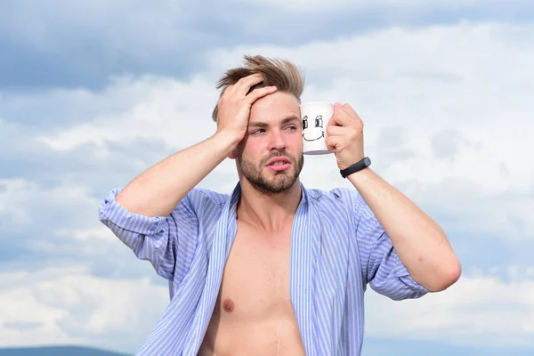 Bearded relaxed guy enjoy healthy morning.