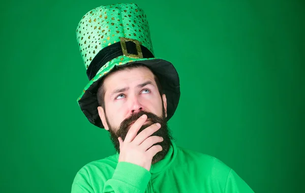 Saint patricks day holiday. Green part of celebration. Happy patricks day. Global celebration. St patricks day holiday known for parades shamrocks and all things Irish. Man bearded hipster wear hat — Stock Photo, Image