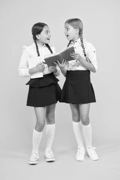 Friendship goals. Cute school girls with books. First day at school. Sharing gossips personal diary. School friendship. Most important thing one learns in school is self esteem support and friendship
