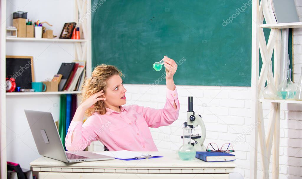 Learning concept. Woman college student classroom hold test tube chemical liquid. Scholarship talented student. Student project investigation. Passionate about science. Inspiration for studying