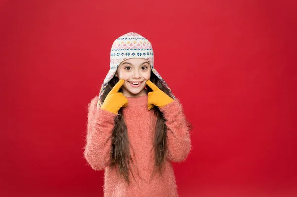 Definition of cool. funny knitwear accessory. small happy girl in knitted hat. cheerful child in gloves wear warm clothes. have fun on winter holiday. christmas time. fashion for kids — Stock Photo, Image