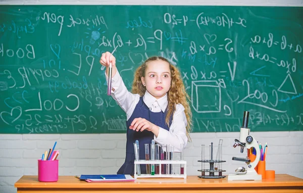 School pupil study chemical liquids. School chemistry lesson. Test tubes with substances. Formal education. Future microbiologist. School laboratory. Girl smart student conduct school experiment — Stock Photo, Image