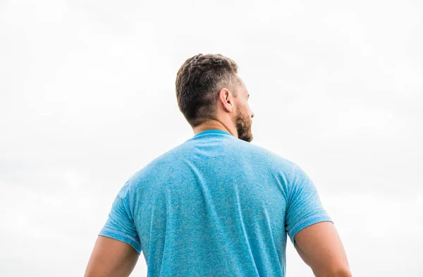 Muscular back man isolated on white. searching for inspiration. planning future goals. rich imagination. standing backwards looking away. feeling lonely. Back view. Concept of thinking — Stock Photo, Image
