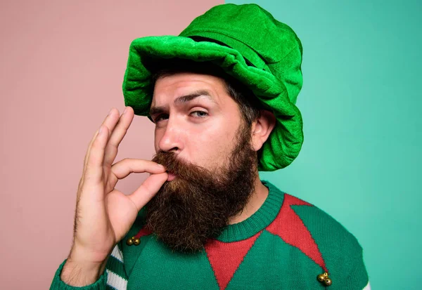 Just perfect. Christmas elf. Elf concept. Happy celebration. Bearded elf. Winter carnival. St Patricks day. Hipster with beard wearing green party costume excellent. Cheerful man celebrate holiday