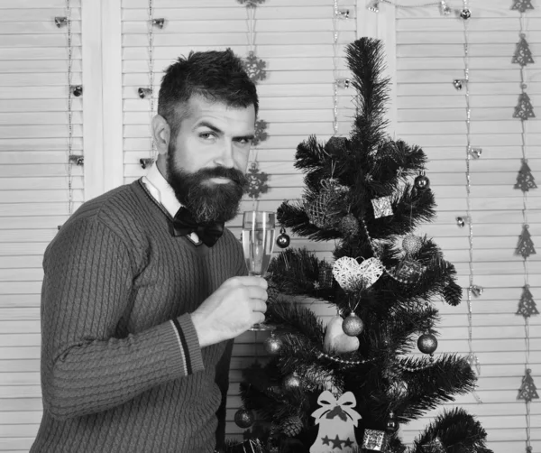 Party man with smiling face in festive room.