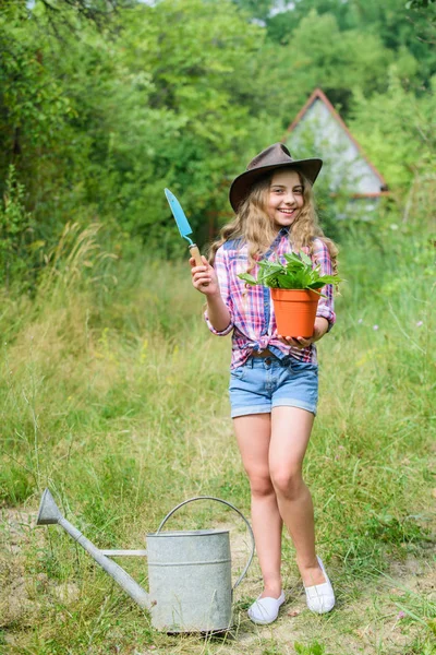 Here i am. hellow summer. small girl planting with shovel. earth day. environment ecology. green nature protection. small girl farmer care about plant in pot. farming and agriculture. spring season — Stock Photo, Image