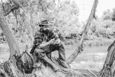 good time. Successful fishing. summer weekend. fisherman on camping. sport activity and hobby. experienced fisher in forest. man with great fish catch. mature man relax after fishing