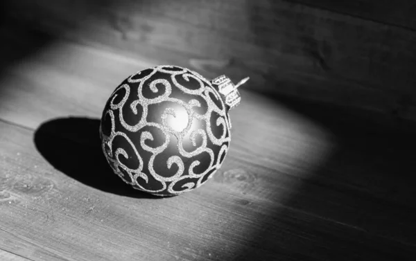 Celebrate christmas. Christmas ball decoration on blue vintage wooden background. Winter holiday concept. Decorate christmas tree with traditional toys. Symbol of new year and christmas holidays