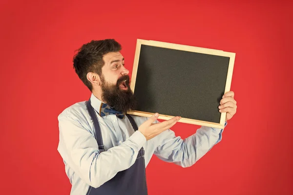 welcome on board. menu board. happy man chef with blackboard, copy space. welcome. Restaurant or cafe advertising. bearded hipster cook in apron. great cuisine. cooking by recipe. welcome to team
