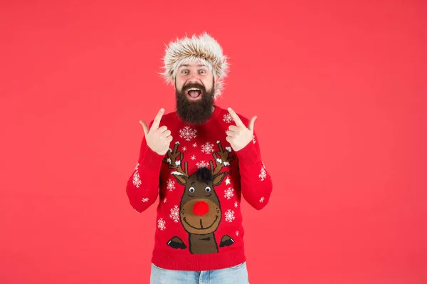 Winter care. Emotional guy. Cold days. Barbershop services. Man with long beard and mustache. Winter mood. Bearded hipster wear knitted sweater and furry hat. Weather forecast. Winter fashion — Stock Photo, Image