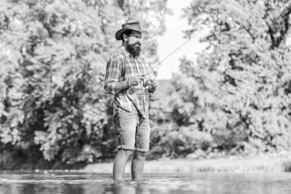 Life is Full of hobby. Successful fly fishing. summer weekend. man catching fish. mature man fly fishing. fisherman show fishing technique use rod. experienced fisher. sport activity and hobby — Stock Photo, Image