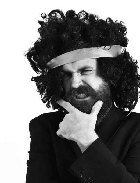 Caucasian hipster in suit and black curly tie-tied afro wig — Stock Photo, Image