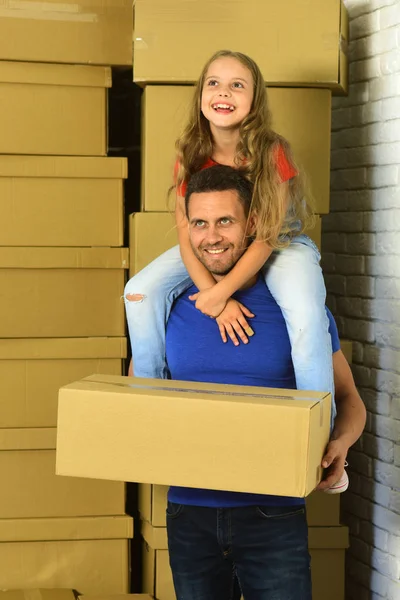 Girl and man with happy smiling faces in room