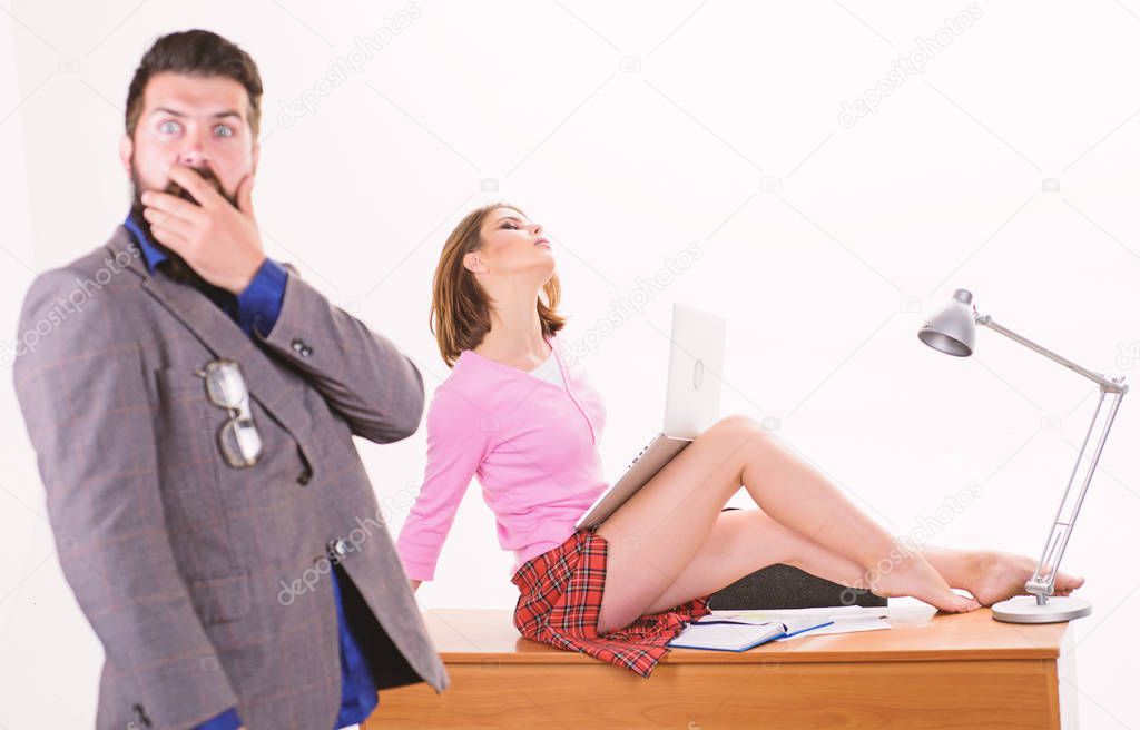 Nothing personal its just business. Sensual personal assistant relaxing on desktop in front of shocked boss. Sexy secretary using personal computer for business. Professional and personal growth