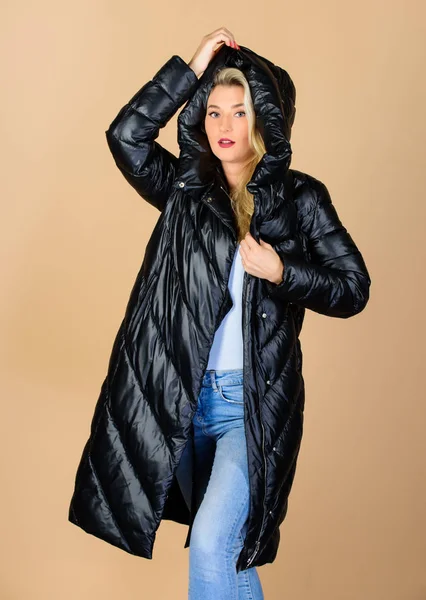 look is great. beauty in winter clothing. cold season shopping. woman in padded warm coat. happy winter holidays. Xmas coming. flu and cold. seasonal fashion. girl in puffed coat. faux fur fashion