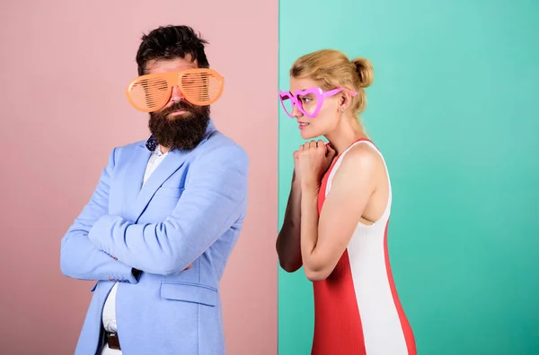 Corporate culture. bearded man with pretty woman. party fun. couple in love. hipster guy and girl party glasses. Office party. Best friends relations. friendship. lets celebrate together