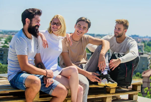 Best day ever. Group of people in casual wear. best friends. Summer vacation. diverse young people talking together. happy men and girl relax. group of four people. great fit for day off