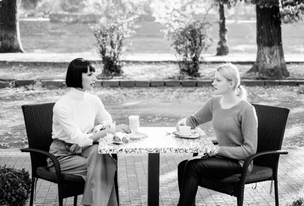 Friendship meeting. Togetherness and female friendship. Trust her. Girls friends drink coffee and enjoy talk. True friendship friendly close relations. Conversation of two women cafe terrace — Stock Photo, Image