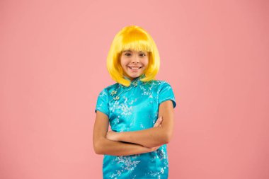 peace and relax. girl yellow hair wig. chinese carnival. happy kid in japanese dress. Portrait of cute girl. japanese kimono. child national costume of japan. small girl traditional eastern clothes clipart