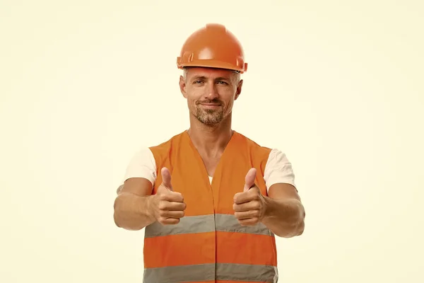 Good job. Safety is main point. Man builder wear protective hard hat and uniform white background. Worker builder confident looking camera. Protective equipment concept. Strong handsome builder — Stock Photo, Image