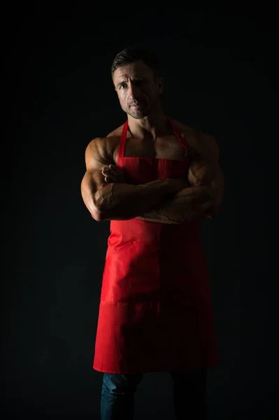 Nutritional scheme. Man chef wear apron. Sexy muscular chef black background. Attractive chef cook. Muscular chef bodybuilder. Sport diet. Delicious recipe. Sexy macho cooking. Food additives — Stock Photo, Image