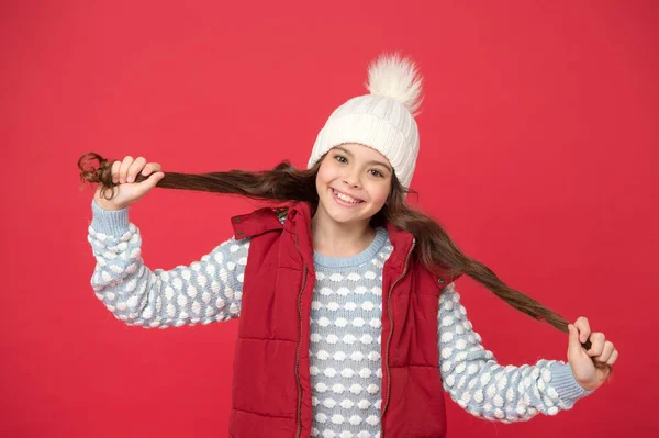 Good vibes. Cheerful child in cosy knitted outfit. Winter fashion. Childhood happiness. Winter activity. Positive concept. Good mood. Emotional wellbeing. Emotions concept. Girl enjoy winter