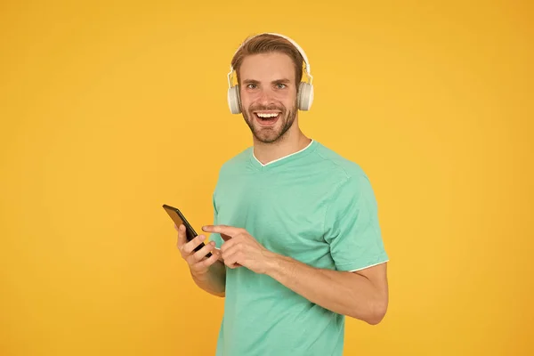 Get music family subscription. Man listen music modern headphones and smartphone. Listen for free. Enjoy music concept. Best music apps that deserve listen. Guy modern user mobile application — Stock Photo, Image