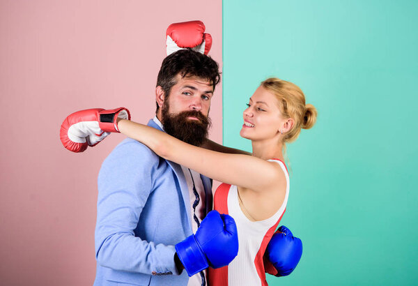 fight for love. Strength and power. bearded man hipster fighting with woman. family couple boxing gloves. knockout punching. who is right. win the fight. problems in relationship. sport