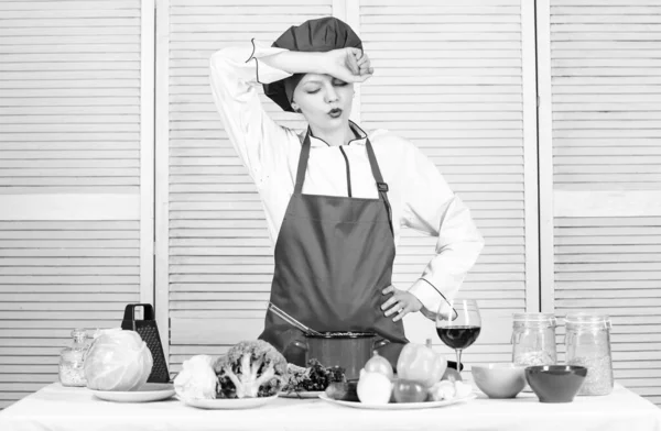 Housewife cooking and drink wine. Enjoy easy ideas for dinner. Woman enjoy cooking food. Housekeeping and culinary. Housewife prepare meal with wine. Housewife daily routine. Girl adorable chef — Stock Photo, Image