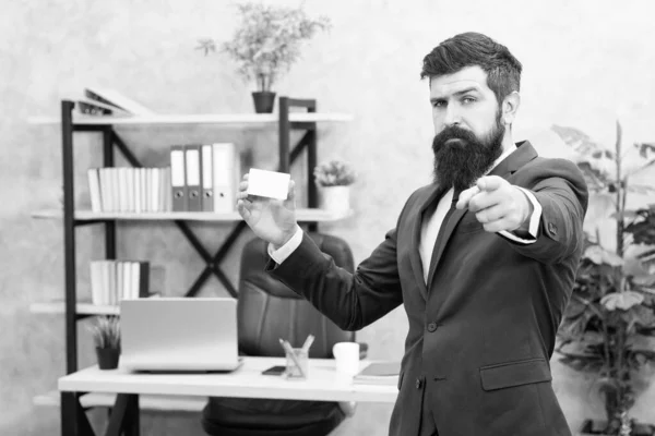 Financial support. Bearded hipster top manager hold card. Banking services. Guy formal suit stand in office. Businessman hold blank card. Finance and accounting. Easy and quick payment. Bank card