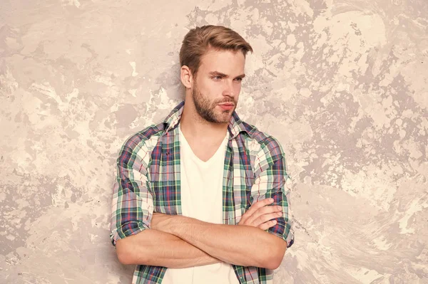 good man hard to find. mens sensuality. sexy guy casual style. macho man grunge wall. male fashion summer trend. confident student checkered shirt. unshaven man care beard. barbershop concept