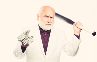 Başarılı bir iş adamı. Acımasız iş hayatı. Raket ve baskın. Kingpin konsepti. Kara nakit para. Kıdemli adam nakit para ve beyzbol sopası tutuyor. Zenginlik refahı. Para karı. Kişisel güvenlik