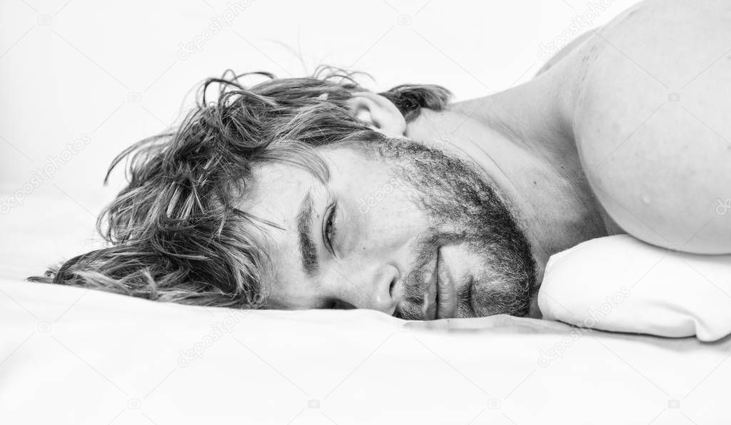 Guy bearded macho relax in morning. Man attractive macho relax and feel comfortable. Simple tips to improve your sleep. Total relax concept. Man unshaven bearded face sleep relax or just wake up