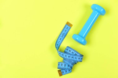 Camgöbeği rengi açık sarı üzerinde Halter ve ölçü birimi bant